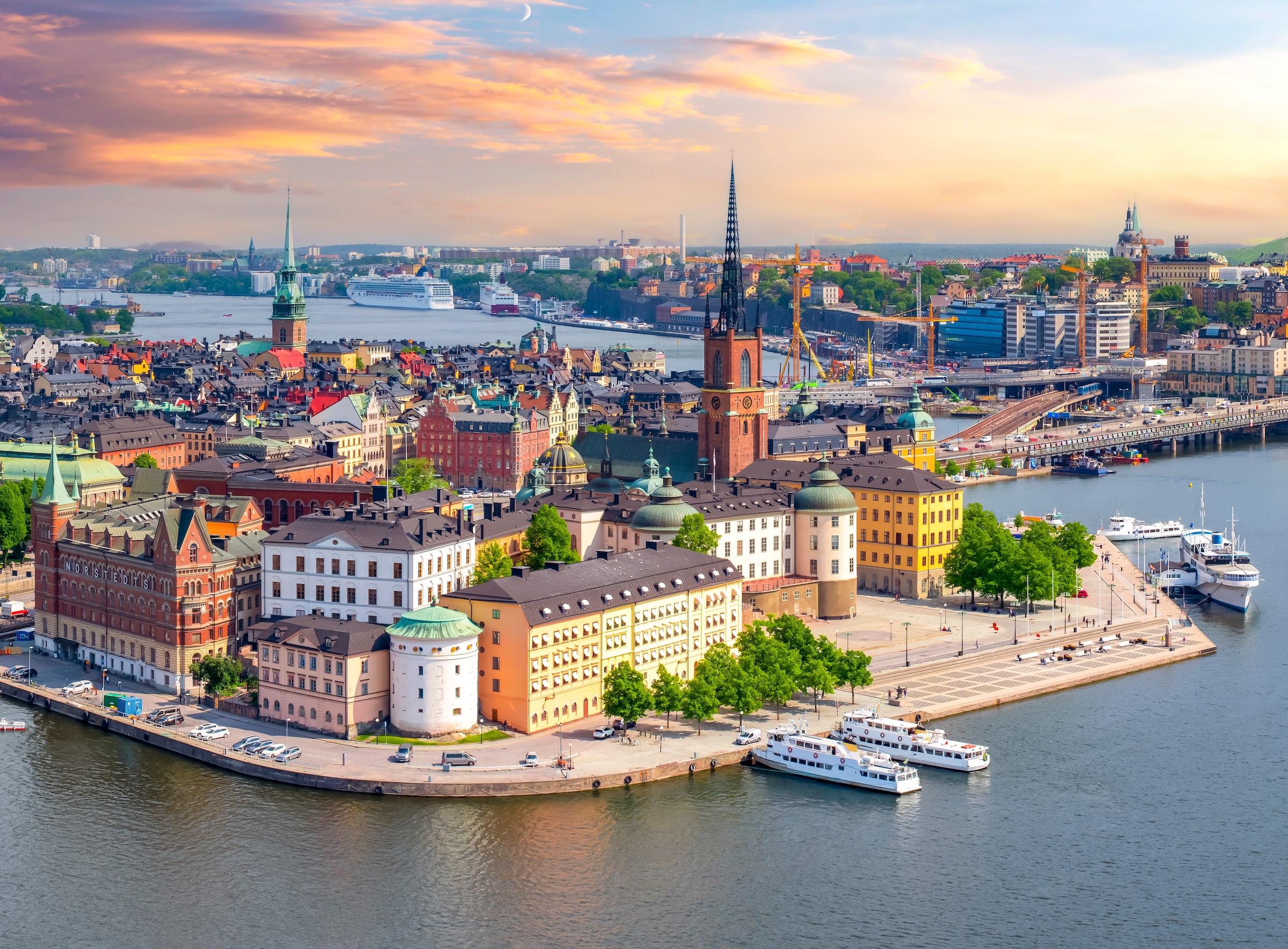 Aerial view of Stockholm's old town Gamla Stan with Riddarholmen Church at sunset